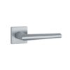The Jasmina handle in satin chrome on a square rosette offers a sleek, modern look for premium interior door handles.
