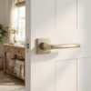 Erba on Square Rosette in satin nickel finish, contemporary modern square internal door handles on a white internal door.