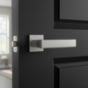 Bold internal door handles in satin chrome, showcasing the Erica square rosette lever with a sleek brushed finish on a dark internal door.
