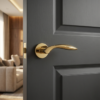 PVD gold Gerbera on Round Rosette, elegant timeless internal door handles displayed on a dark grey door in a luxurious contemporary setting.