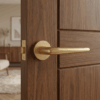 Designer round internal door handles – Lavanda on Round Rosette in elegant matt gold styled on a rich wood internal door.